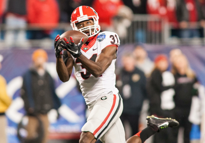 Dec 30 2014 Charlotte NC USA Georgia Bulldogs wide receiver Chris Conley catches a pass for a touchdown during the first quarter against the Louisville Cardinals of the Belk Bowl held at Bank of America Stadium. Mandatory Credit Jeremy Brevard