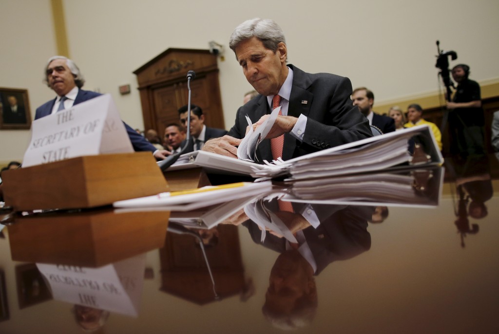 U.S. Secretary of State John Kerry and U.S. Secretary of Energy Ernest Moniz arrive to testify before a House Foreign Affairs Committee hearing on the Iran nuclear agreement in Washington