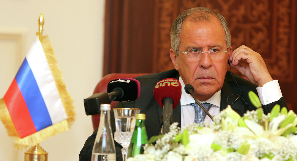 Russia's Foreign Minister Sergey Lavrov listens during a joint press conference with Qatari Foreign Minister Khalid bin Mohammad Al Attiyah