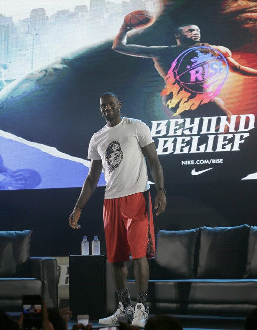 NBA basketball player Le Bron James of the Cleveland Cavaliers arrives for a news conference to launch a Nike sponsored television program Thursday Aug. 20 2015 in suburban Mandaluyong city east of Manila Philippines. James is also in the Philippines