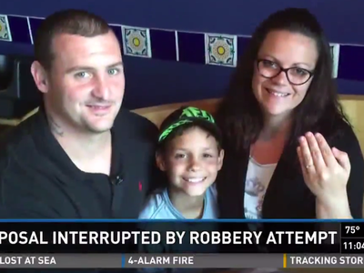 Watch: Man's Proposal To His Girlfriend Interrupted By A Robber, So He Does