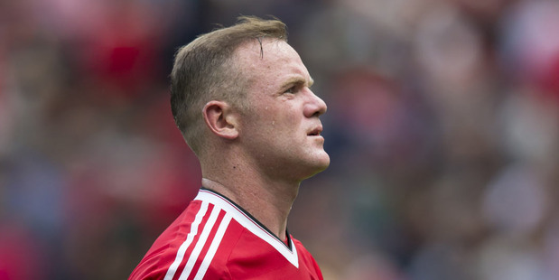 Manchester United's Wayne Rooney walks from the pitch after his team's scoreless draw with Newcastle