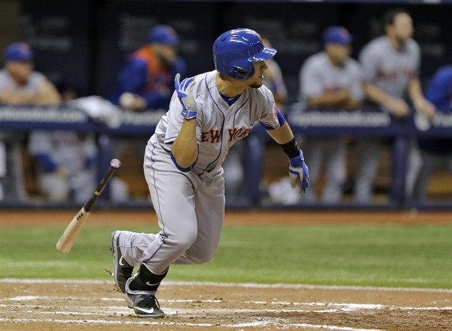 New York Mets Michael Conforto hits an RBI-double off Tampa Bay Rays relief pitcher Brad Boxberger during the ninth inning of an interleague baseball game Friday Aug. 7 2015 in St. Petersburg Fla. Mets Lucas Duda scored on the hit. (AP