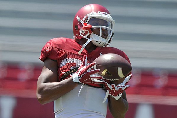 Michael Woods										Arkansas running back Jonathan Williams warms up prior to practice Saturday Aug. 15 2015 at Razorback Stadium in Fayetteville