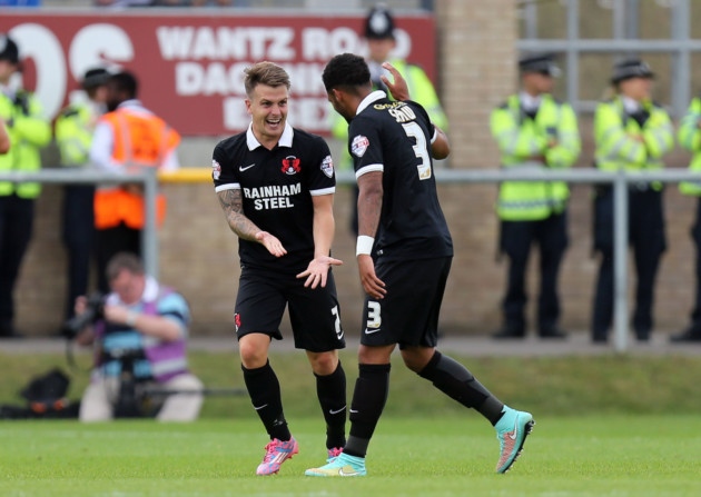 Leyton Orient midfielder Dean Cox celebrates with team mate Frazer Shaw after scoring against Dagenham & Redbridge