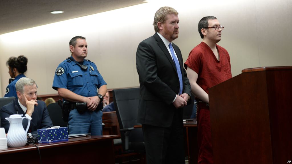 Colorado theater shooter James Holmes appears in court with his attorney Daniel King to be formally sentenced as Prosecutor George Brauchler looks on in Centennial Colorado Aug. 26 2015