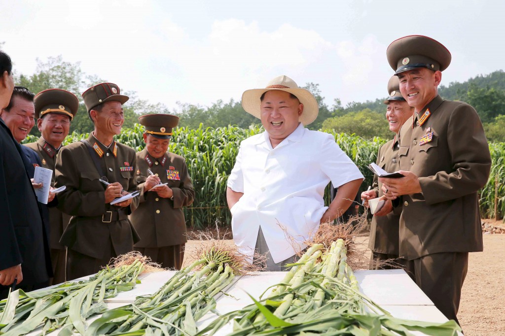 North Korean leader Kim gives field guidance to Farm No. 1116 under the KPA Unit 810 in this undated