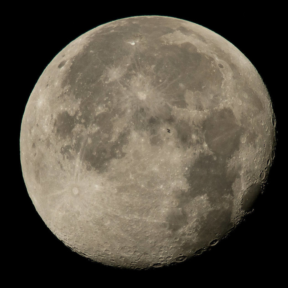 This image released on August 2 shows the International Space Station transiting the moon at roughly five miles per second. Six crew members are currently on board