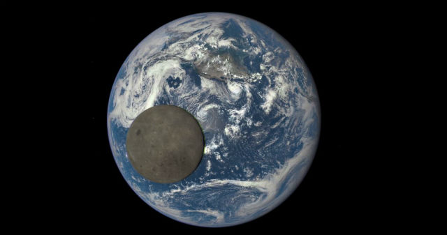 A NASA camera aboard the Deep Space Climate Observatory satellite captured a unique view of the moon as it moved in front of the sunlit side of Earth last month. Credit NASA  NOAA