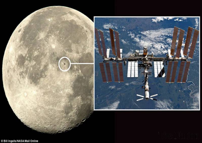 ISS captures moon in rare pass