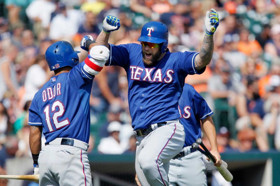 Texas Rangers Mike Napoli celibates with Rougned Odor after hitting a solo home run against the Detroit Tigers during the eighth inning of a baseball game at Comerica Park Sunday Aug. 23 2015 in Detroit