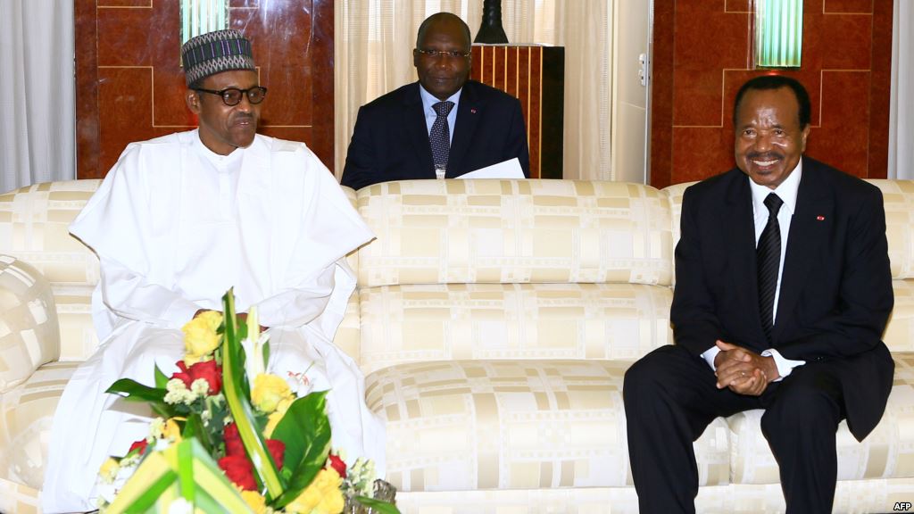 President of Cameroon Paul Biya meeting with his Nigerian counterpart Muhammadu Buhari at the presidential palace in Yaounde Cameroon