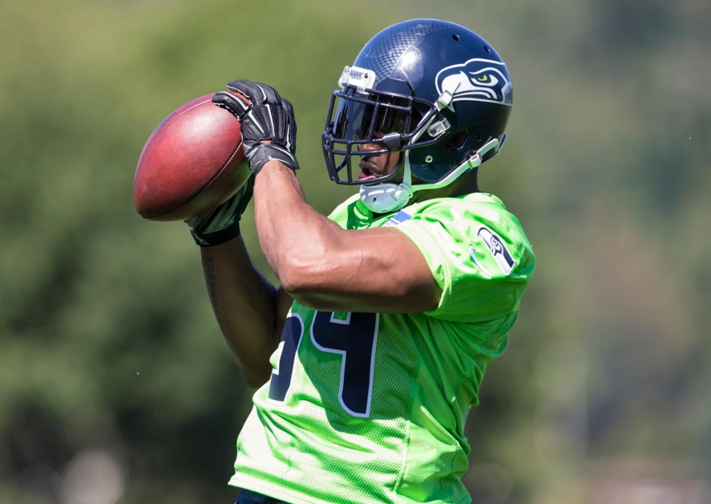 Seattle Seahawks linebacker Bobby Wagner catches a ball in drills during an NFL football training camp