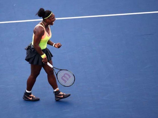 Serena Williams celebrates after defeating Tsvetana Pironkova of Bulgaria during the Western & Southern Open at the Linder Family Tennis Center