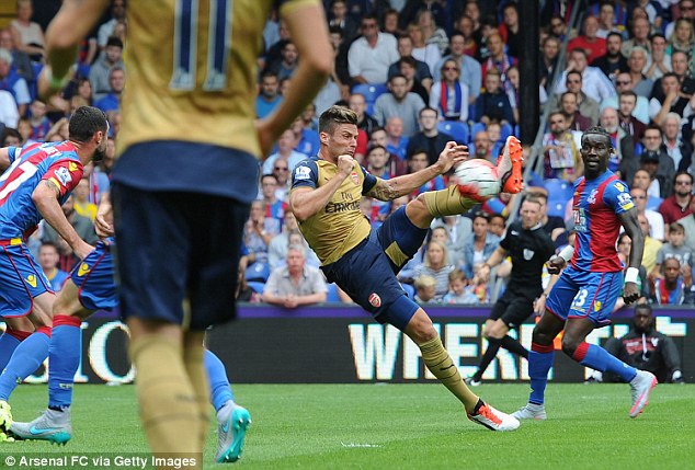 Olivier Giroud scores with a magnificent volley to put Arsenal ahead against Crystal Palace