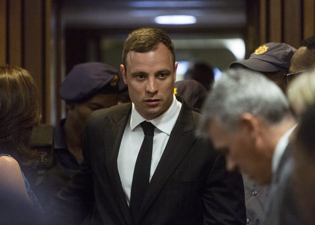 Oscar Pistorius arrives in court in this Oct. 13 2014 file