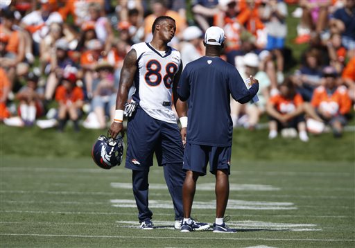 WATCH: Peyton Manning throws routes to kids during Broncos training camp