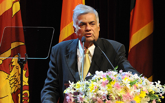 Sri Lanka's prime minister sworn in as 2 parties sign deal