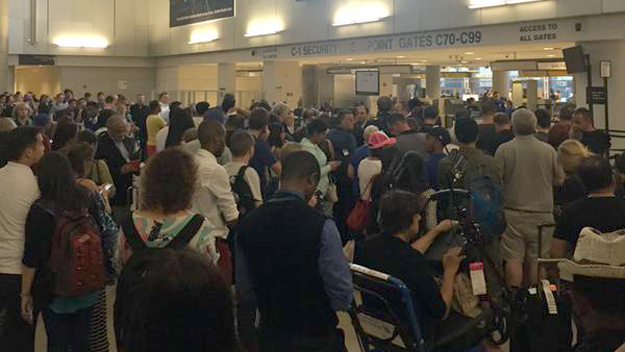 Passengers at Newark Liberty Internation Airport following a security breach at Terminal C on Aug. 30 2015