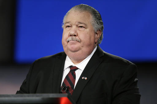 Iowa Republican senatorial candidate college professor Sam Clovis looks on before a live televised debate at Iowa Public Television studios