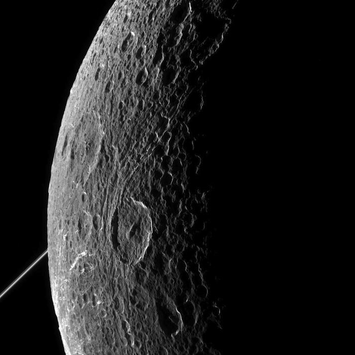 At such a close distance Saturn's moon Dione looks similar to Earth's moon