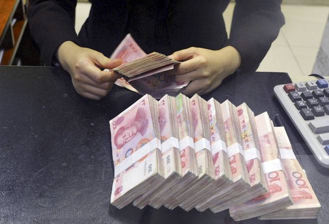 China pushes yuan down further amid fears of currency war