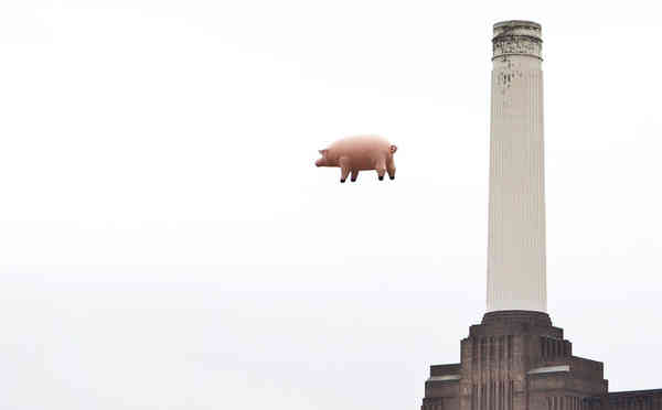 Pink Floyd's inflated pig has been pulled from the auction block because the band want him back