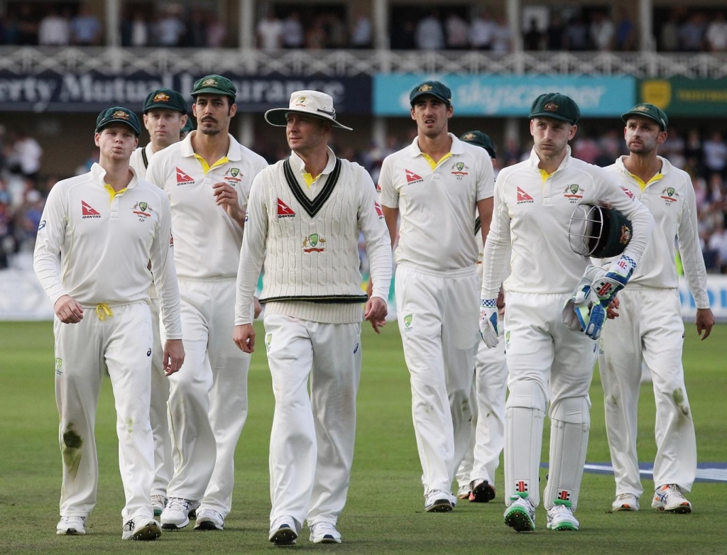 Caption:Australian captain Michael Clarke leads his players from the pitch at the end of the first day of the fourth Ashes cricket Test match between England and Australia at Trent Bridge in Nottingham England