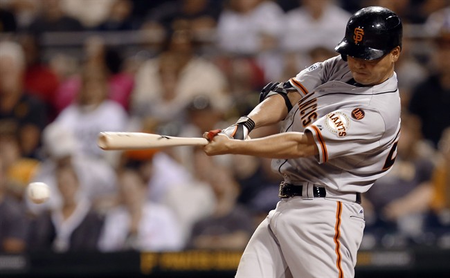 San Francisco Giants Nori Aoki gets a base hit to lead off the ninth inning of a baseball game against the Pittsburgh Pirates Thursday Aug. 20 2015 in Pittsburgh. The Pirates won 4-0