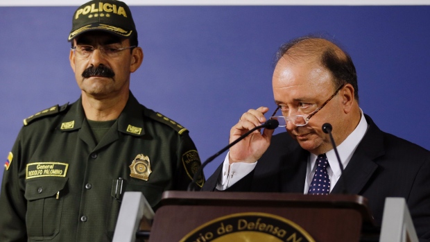 Colombian Defence Minister Luis Carlos Villegas right said during a news conference that 16 police officers died when the helicopter they were travelling in crashed during a manhunt for a drug trafficker