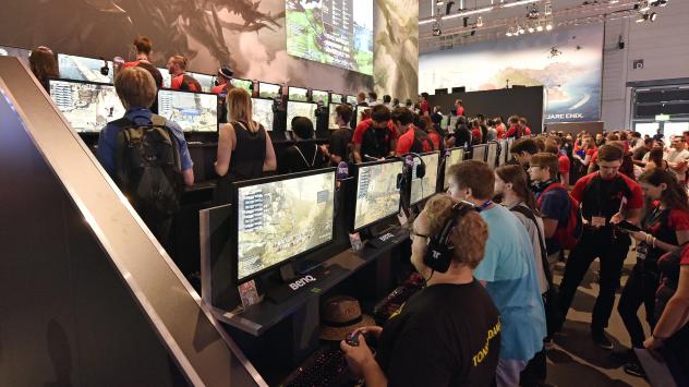 Participants play the latest video games at the gamescom computer game fair in Cologne Germany on Wednesday. ESL which sponsors a tournament in the city later this month says it require random drug tests to ensure players are clean