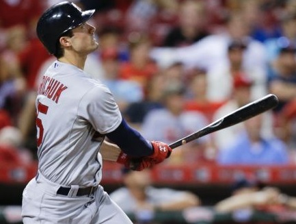 Randal Grichuk watches his home run leave the park