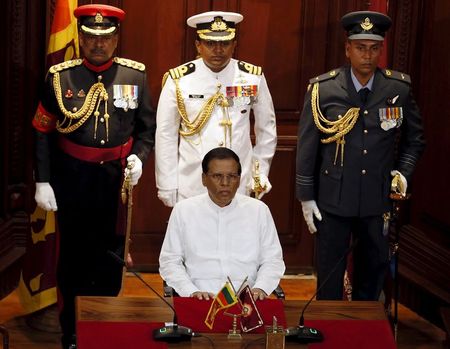 Sri Lanka's prime minister sworn in as 2 parties sign deal