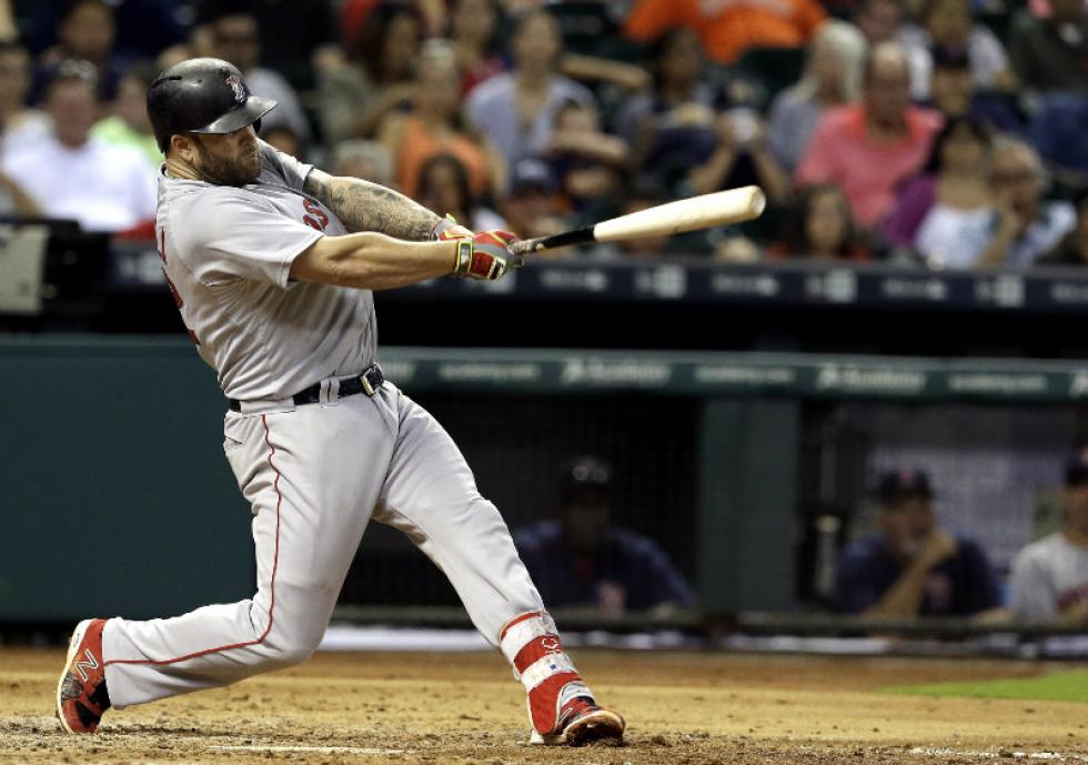 Boston Red Sox's Jackie Bradley Jr. watches his three-run triple to right field during the eighth inning of a baseball game against the Detroit Tigers Sunday Aug. 9 2015 in Detroit