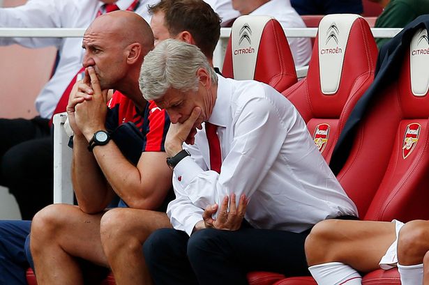 Arsene Wenger looks dejected