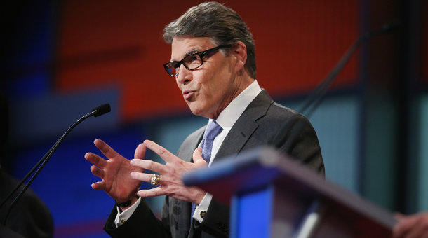 Republican presidential candidate Rick Perry fields a question during a presidential forum hosted by FOX News and Facebook in Cleveland on August 6