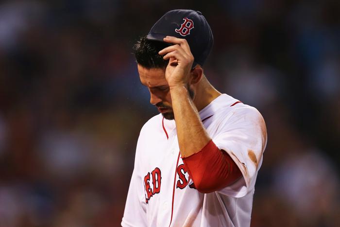 BOSTON MA- JULY 29 Rick Porcello #22 of the Boston Red Sox is relieved during the third inning after allowing six runs against the Chicago White Sox during the third inning at Fenway Park