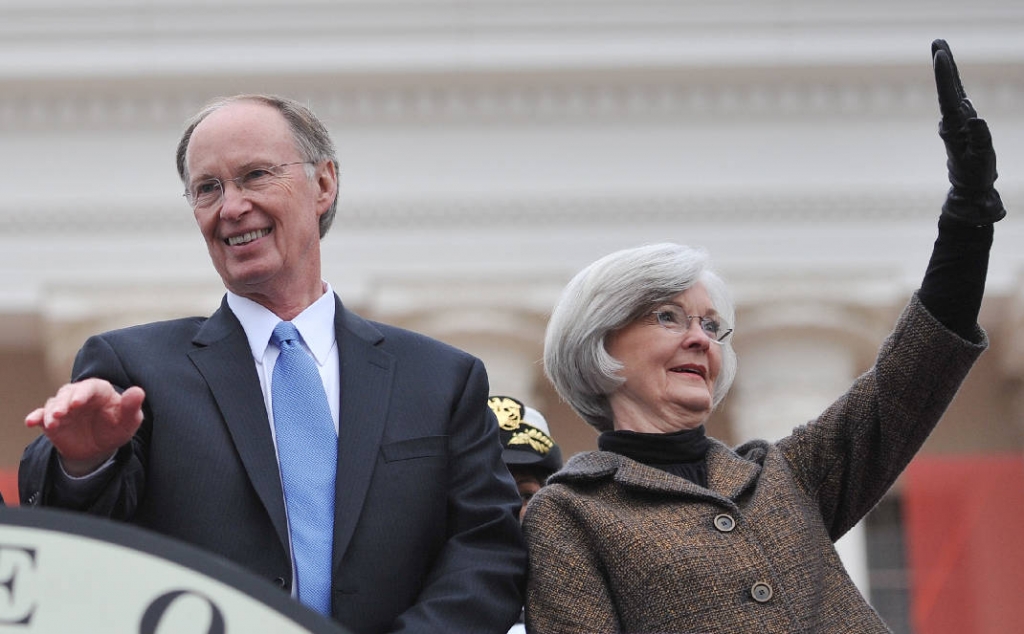 Robert Bentley and his wife Dianne wave to supporters during inaugural ceremonies at the Alabama Capitol