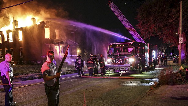 Protests turn violent in St. Louis after police shooting of suspect, 18, that