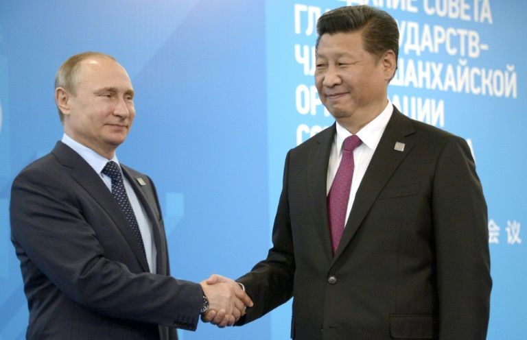 Russia China start joint air and navy drills