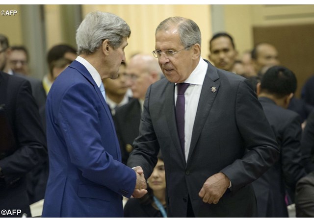 Russian Foreign Minister Sergey Lavrov greets US Secretary of State John Kerry  AFP