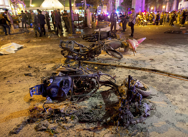 Security forces and emergency workers at the scene of a bomb blast in central Bangkok