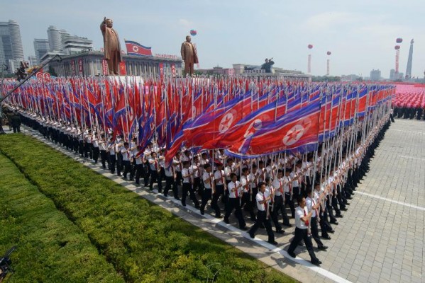 South Korean Unification Ministry South Korean presidential security adviser Kim Kwan-jin right shakes hands with Hwang Pyong So North Korea's top political officer for the Korean People's Army after their meeting at the