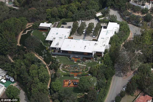 The scene of their date At Aniston's nuptials which took place at the Friends star's Bel-Air California home'they were very affectionate' said a source