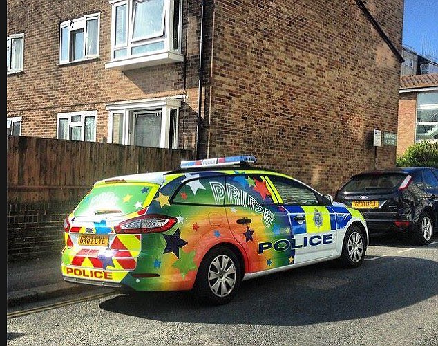 Stylish The police car was decorated with a vibrant rainbow pattern and the word'Pride written on the side to celebrate the town's Gay Pride festival