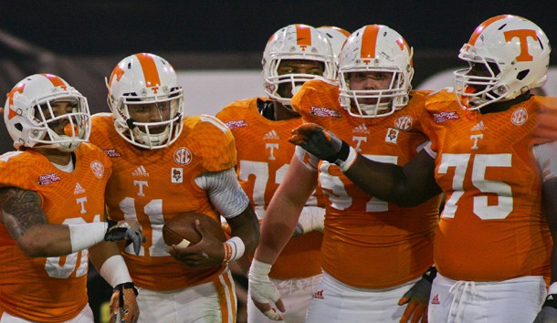 Jan 2 2015 Jacksonville FL USA Tennessee Volunteers quarterback Joshua Dobbs is congratulated by wide receiver Johnathon Johnson and guard Jashon Robertson and center Mack Crowder and offensive lineman Marcus Jackson