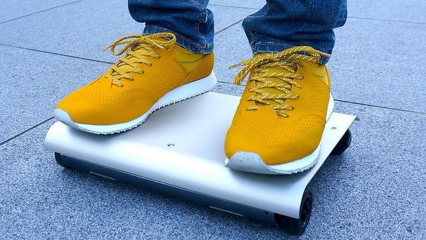 The laptop-sized Walk Car designed by Kuniaki Sato for Japanese manufacturer Cocoa Motors