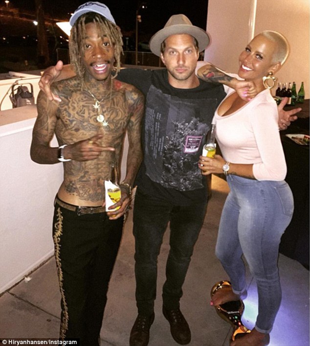 Reunion After nearly one year of divorce Amber Rose and Wiz Khalifa appeared together in an Instagram