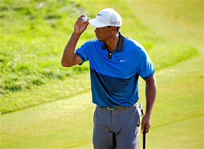 Tiger Woods tipping his cap morning on Whistling Straits’ No 18 hole after finishing his second round of the PGA Championship