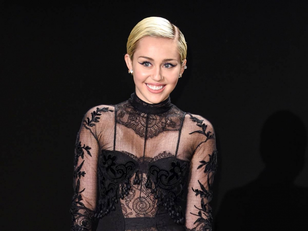 Miley Cyrus arrives at the Tom Ford Autumn  Winter 2015 Womenswear Presentation in Los Angeles